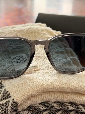 Persol Transparent Grey Frame Sunglasses with Blue/Grey Polarized Lenses